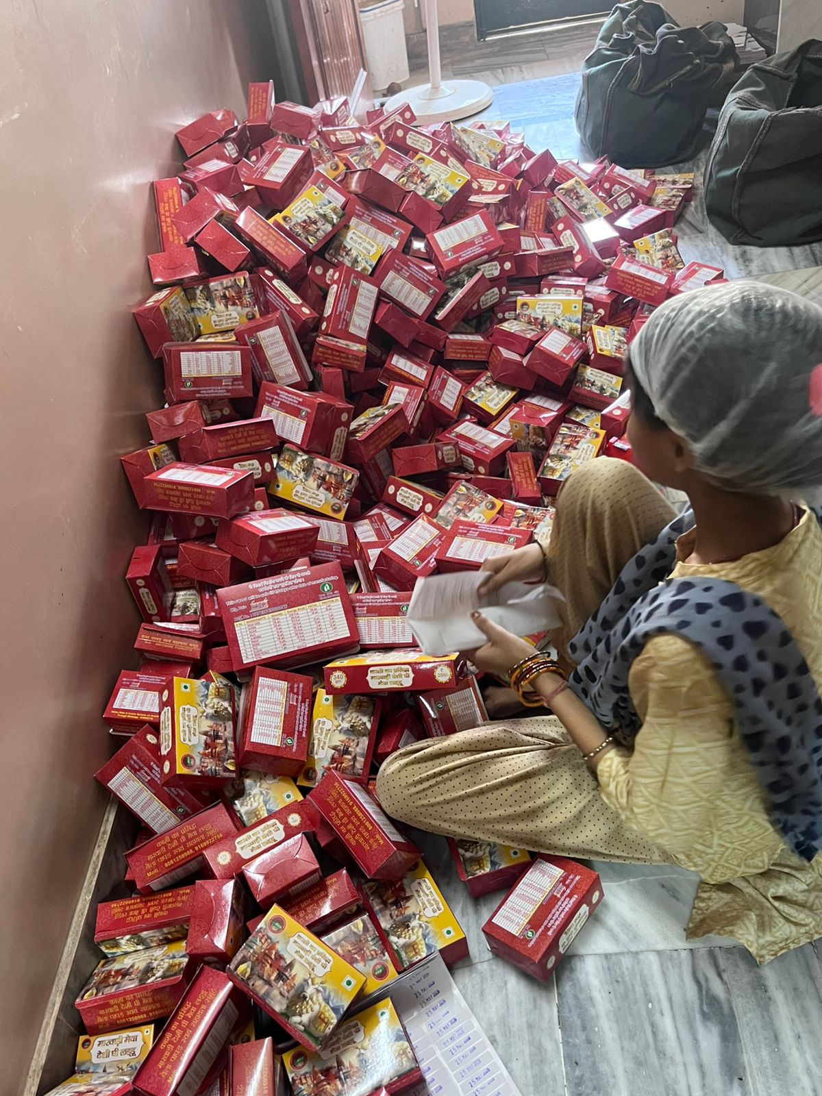 Women packing boxes